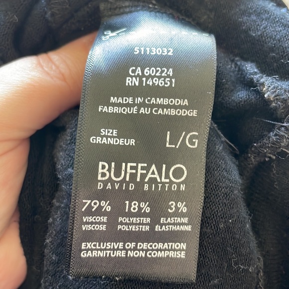 Longer black sweater with white stars. - Picture 6 of 6